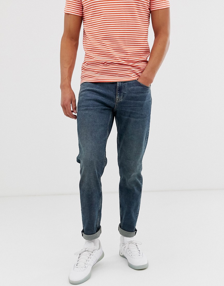 ASOS DESIGN - tapered jeans med stræk i vintage dark wash blå