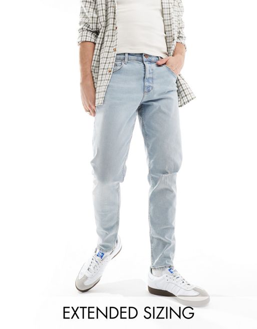 FhyzicsShops DESIGN tapered jeans with rips in light wash blue