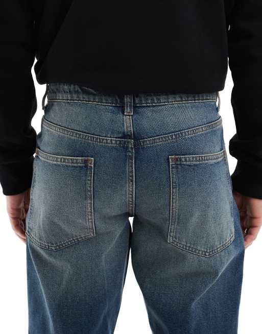 ASOS DESIGN tapered jeans with vintage tint in dark wash blue, 4 of 5