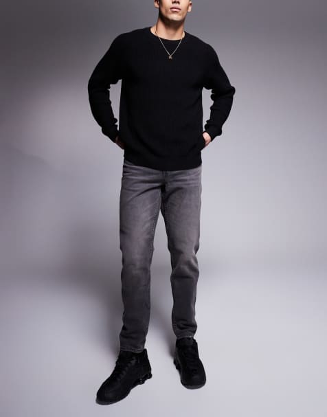 ASOS DESIGN tapered jeans with vintage tint in washed black - view 1