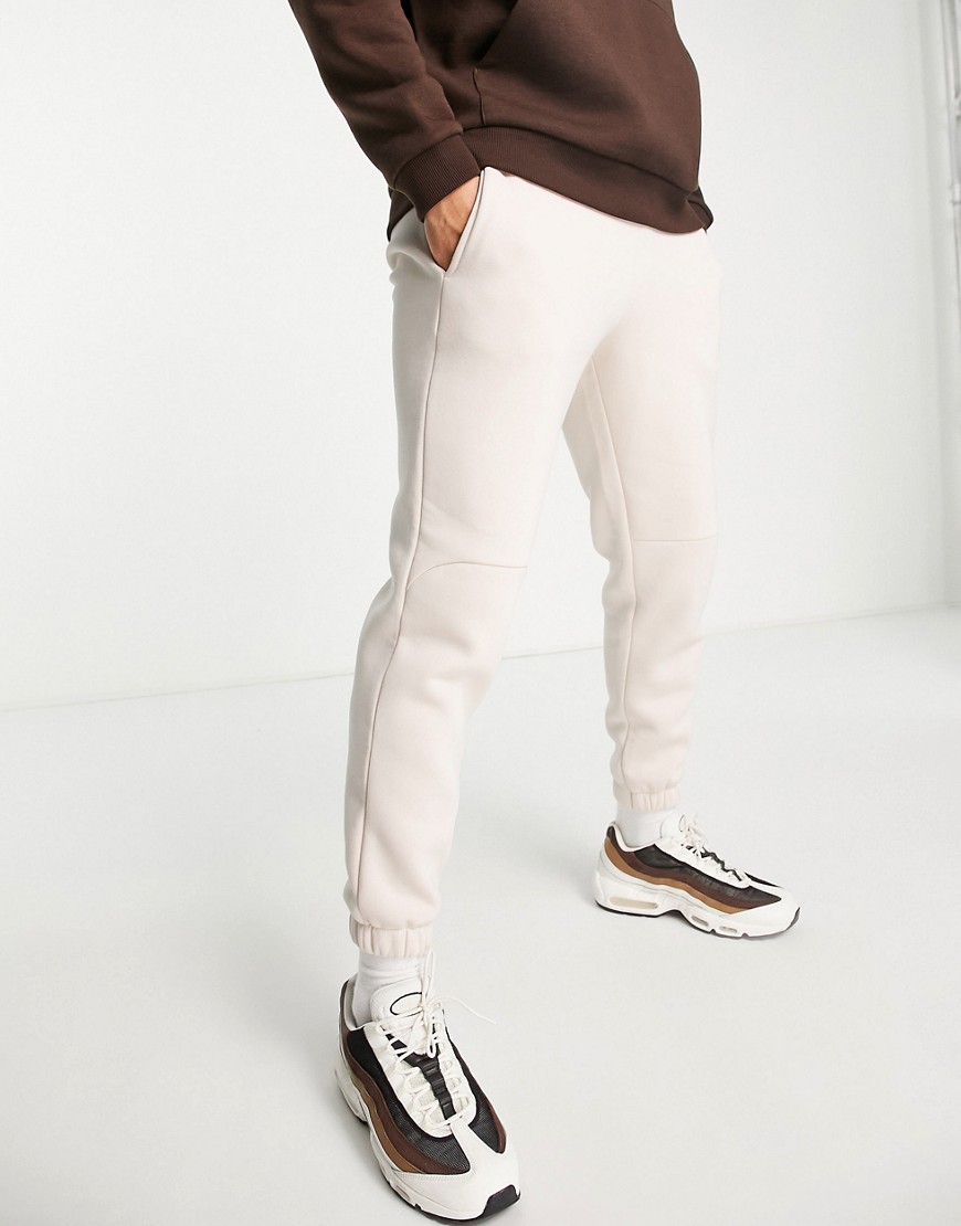 ASOS DESIGN tapered joggers in beige-Neutral