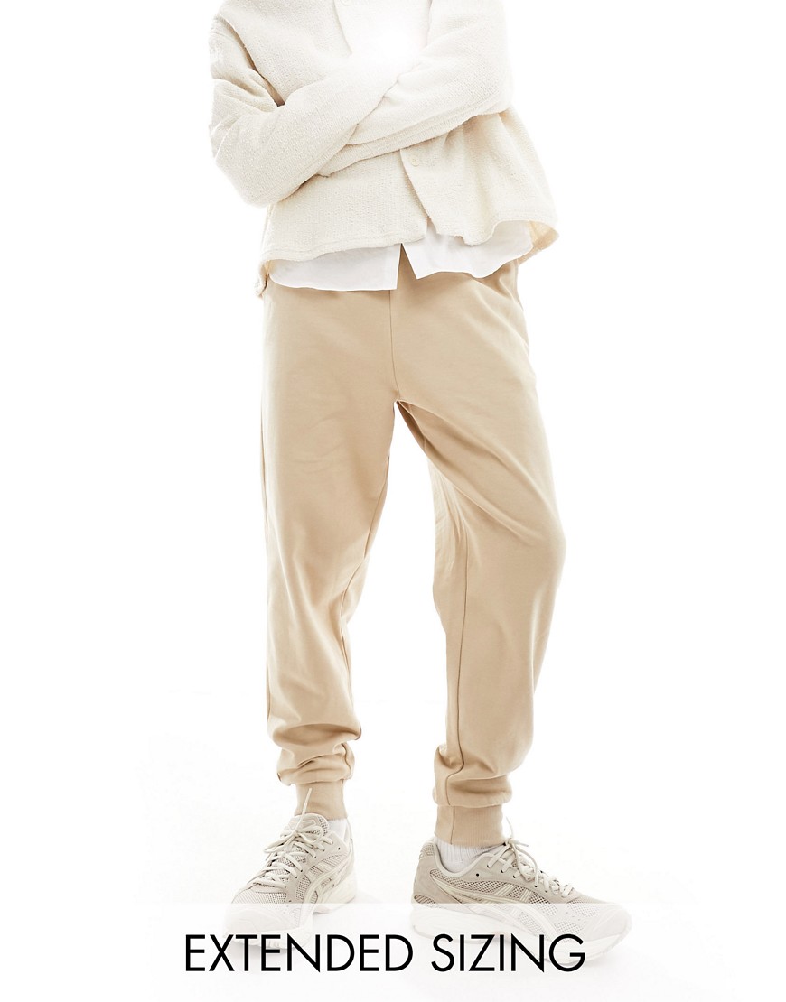 ASOS DESIGN tapered joggers in beige-Neutral