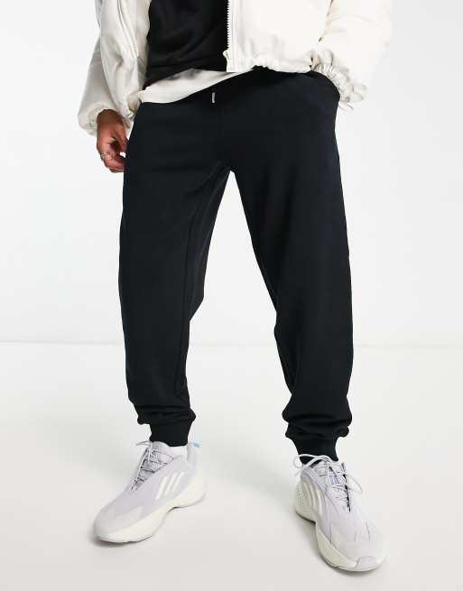 ASOS DESIGN tapered joggers in black