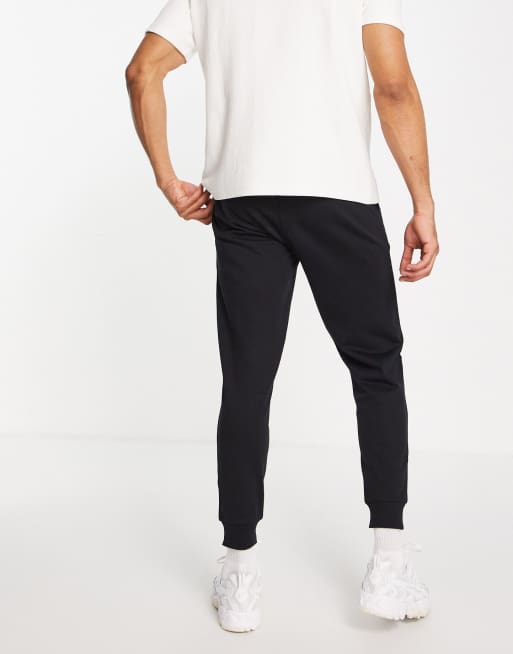 ASOS DESIGN tapered joggers in black