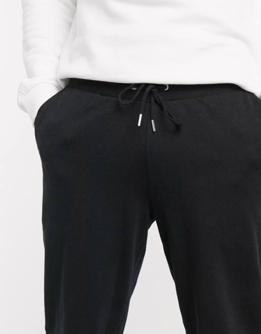 ASOS DESIGN tapered joggers in black