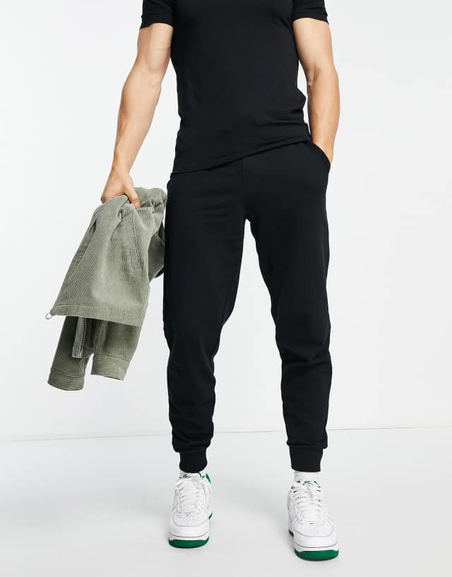 ASOS DESIGN tapered joggers in black