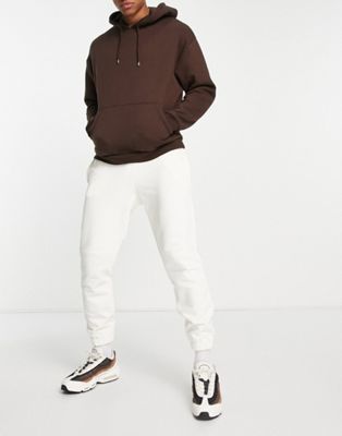 ASOS DESIGN tapered joggers in off white