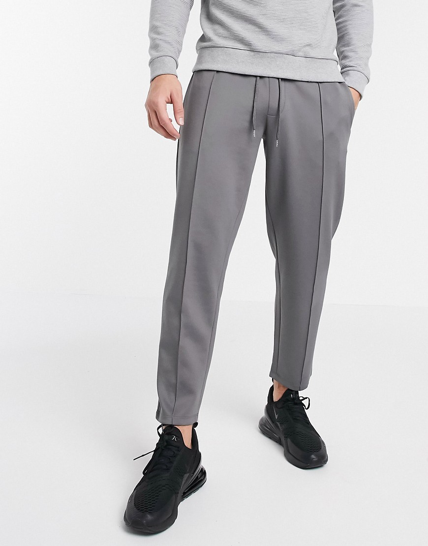 ASOS DESIGN tapered joggers in scuba fabric with pin tucks & fixed hem in grey