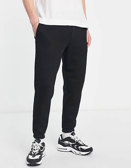 ASOS DESIGN tapered joggers with panel detail in black | ASOS