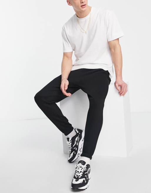 ASOS DESIGN tapered joggers in black