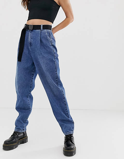 ASOS DESIGN tapered leg boyfriend jeans with curve seam in mid vintage wash with webbing belt