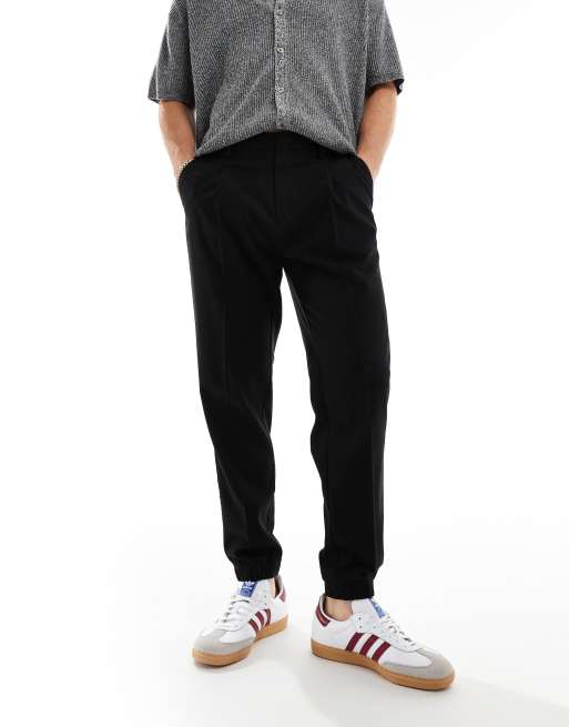 ASOS DESIGN - Tapered og elegante bukser i sort med jogginbukse-åbning