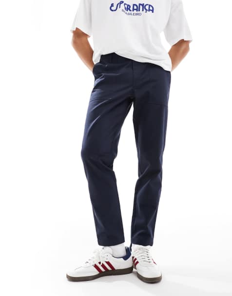 ASOS DESIGN tapered pants in navy - view 1