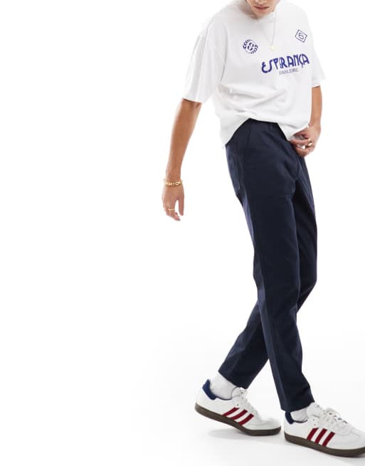 ASOS DESIGN tapered trousers in navy