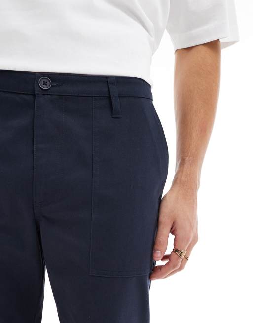 ASOS DESIGN tapered trousers in navy