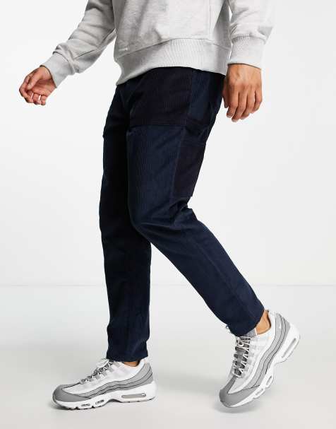 ASOS DESIGN tapered pants with carpenter pockets in cord - view 1