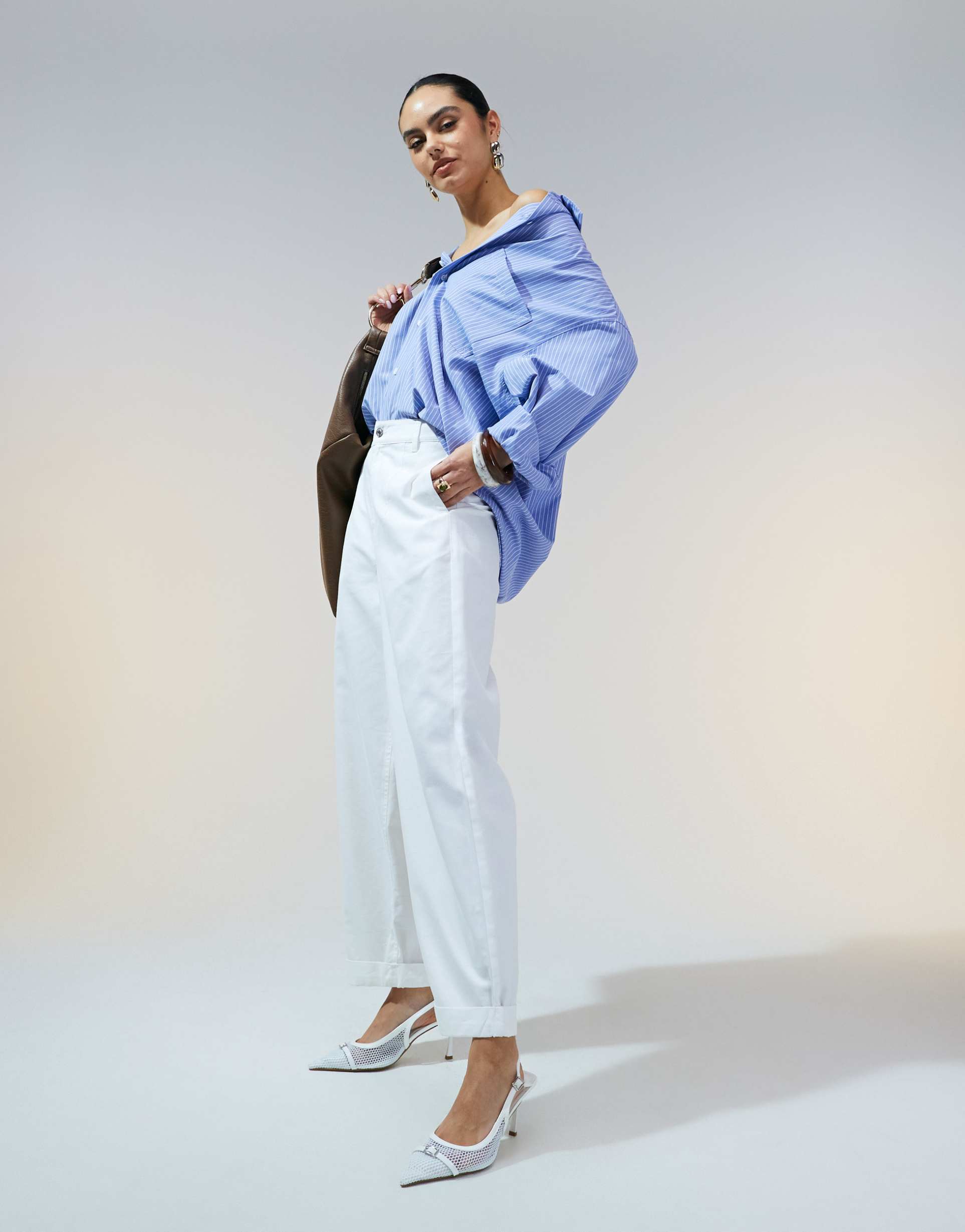 asos design tapered pants with turn-up detail in off-white