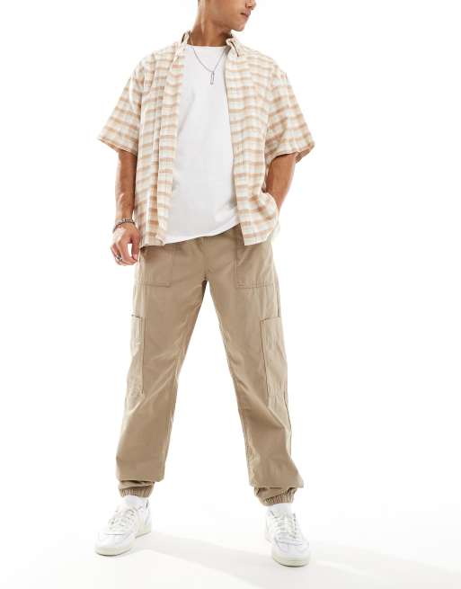 ASOS DESIGN tapered pull on cargo jogger in brown , 4 of 5