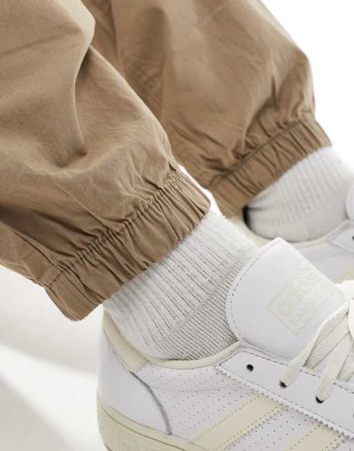 ASOS DESIGN tapered pull on cargo sweatpants in brown , 2 of 5