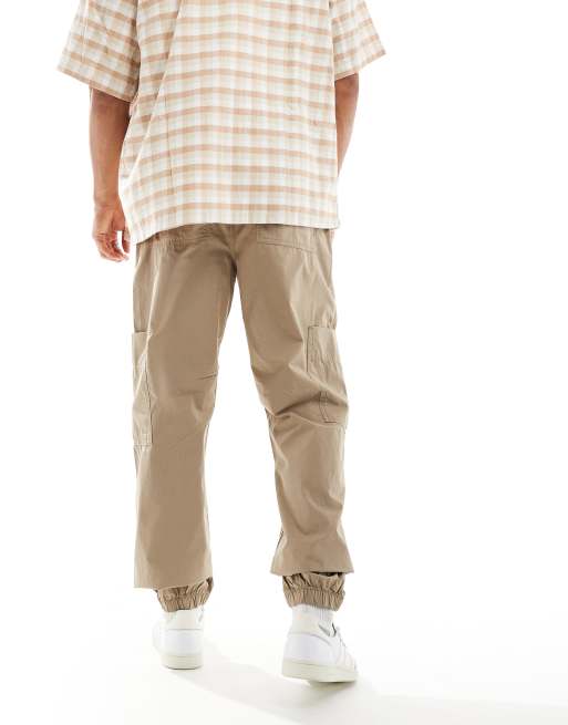 ASOS DESIGN tapered pull on cargo sweatpants in brown , 3 of 5
