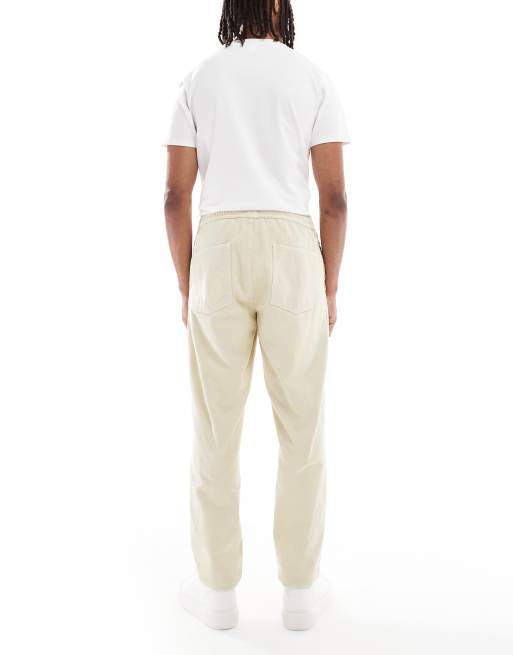 ASOS DESIGN tapered pull on chinos in beige, 2 of 5