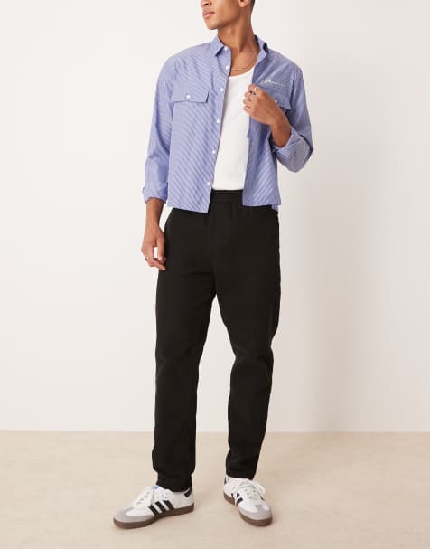 ASOS DESIGN tapered pull on chinos in black - view 1