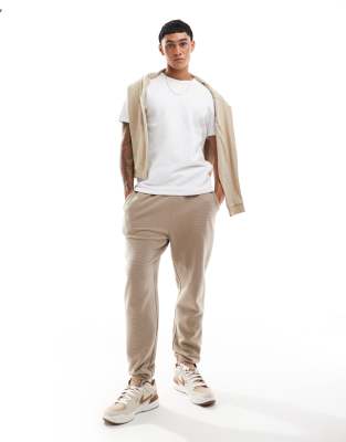 ASOS DESIGN ASOS DESIGN tapered rib jogger in beige-Black