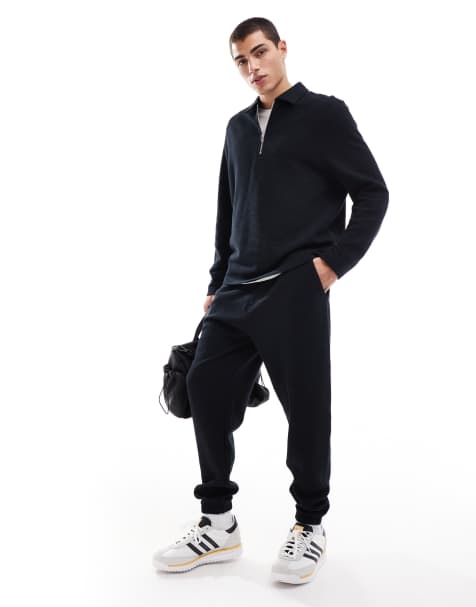 ASOS DESIGN tapered rib trackies in black - view 1