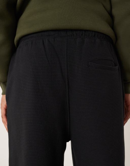ASOS DESIGN tapered ribbed trackies in black (Part of a set), 5 of 5