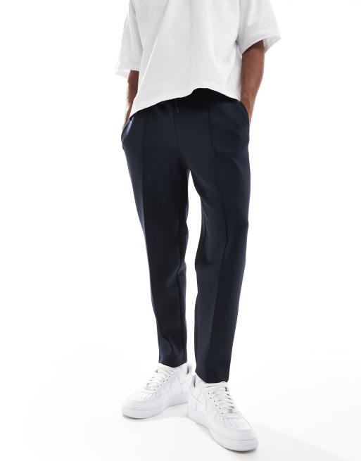 ASOS DESIGN tapered scuba joggers in navy ASOS