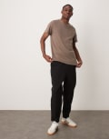 [ASOS DESIGN] ASOS DESIGN tapered scuba-style fabric trackies with pleat detail in black 2XL BLACK
