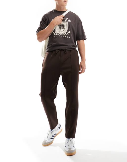ASOS DESIGN tapered scuba trackies in brown