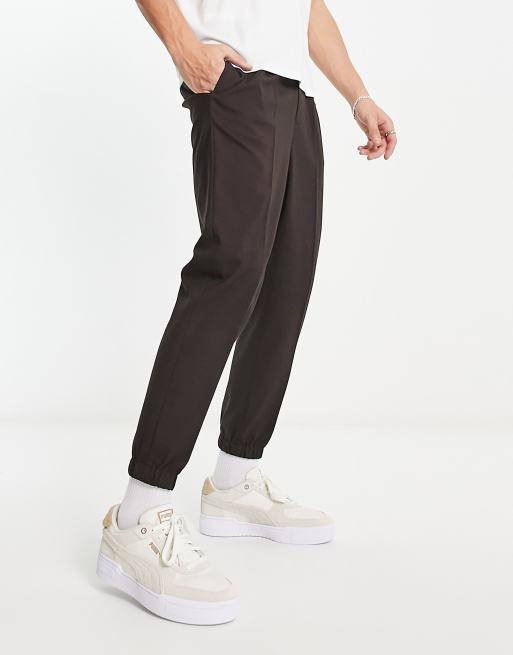 Asos Tapered Joggers With Pocket In Rust, $16, Asos