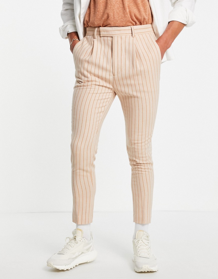 ASOS DESIGN tapered smart pants in peach pinstripe-Pink