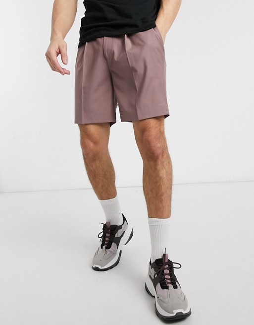 ASOS DESIGN tapered smart shorts in pink with pleats