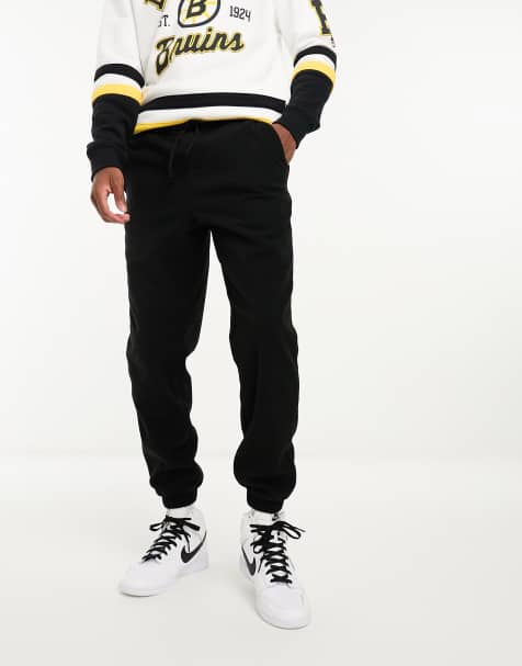 ASOS DESIGN - Tapered sorte joggingbukser i fleece - view 1