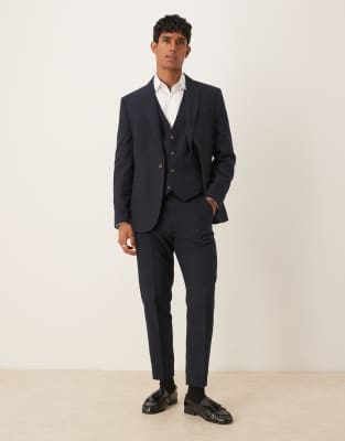 tapered suit pants in navy herringbone wool look