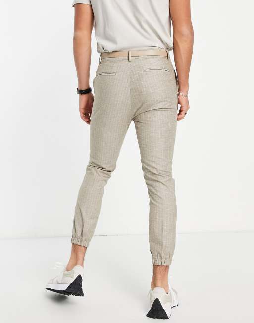 ASOS DESIGN tapered suit pants in stone stripe with jogger cuff