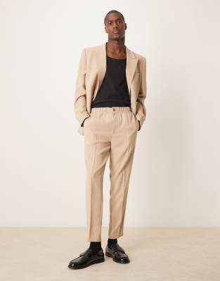 ASOS DESIGN tapered suit pants in stone texture-Neutral