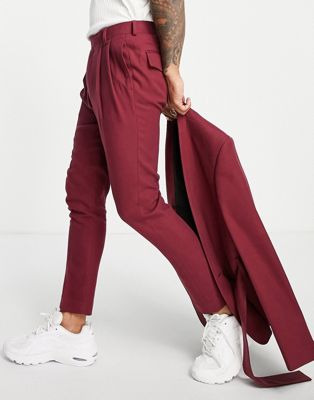 ASOS DESIGN tapered suit trousers in burgundy