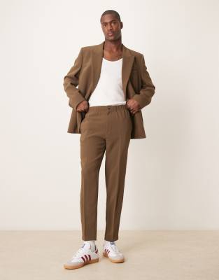 ASOS DESIGN ASOS DESIGN tapered suit trousers in khaki texture-Green