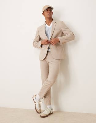 ASOS DESIGN tapered suit trousers in stone-Neutral