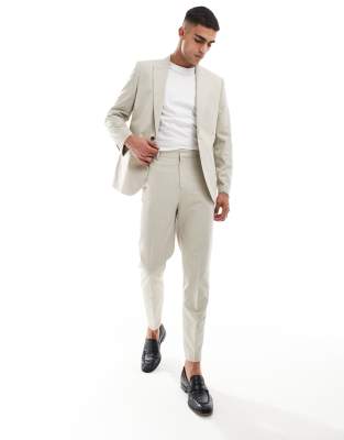 ASOS DESIGN tapered suit trousers in textured fabric in stone-Neutral