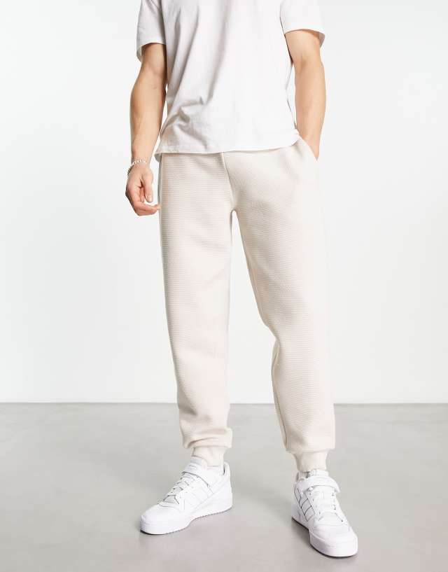 ASOS DESIGN tapered sweatpants in beige jacquard - part of a set