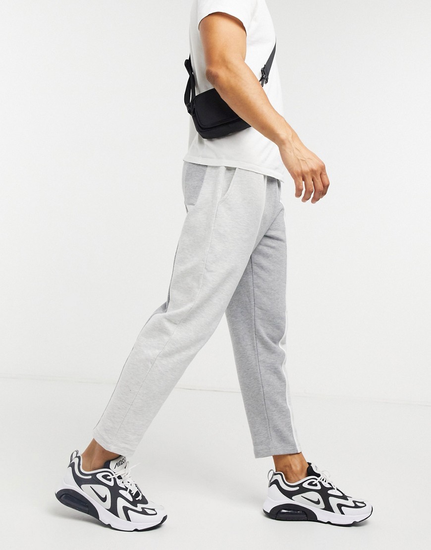 ASOS DESIGN tapered sweatpants in tonal color blocking-Grey