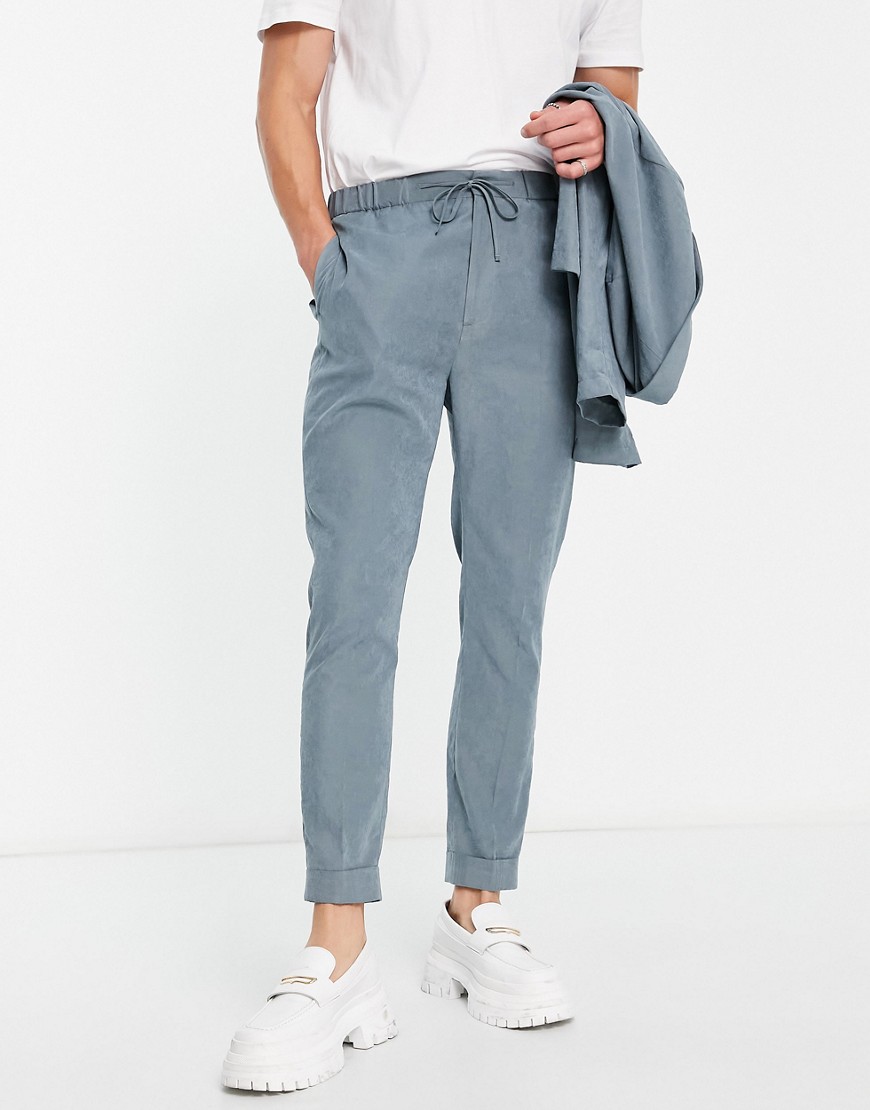 ASOS DESIGN tapered sweatpants waist suit pants in muted blue suede