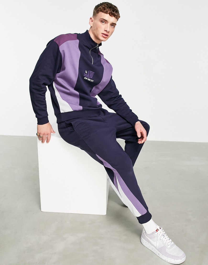 ASOS DESIGN tapered sweatpants with color block diagonal side panels in navy & purples - part of a set-Black