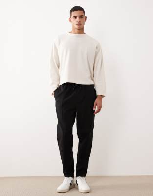 Asos Design Tapered Sweatpants With Pin Tuck In Black