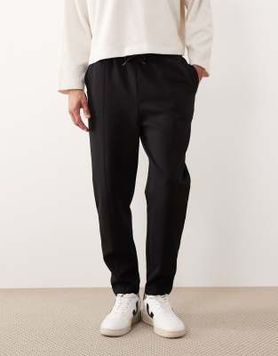 Asos Design Tapered Sweatpants With Pin Tuck In Black