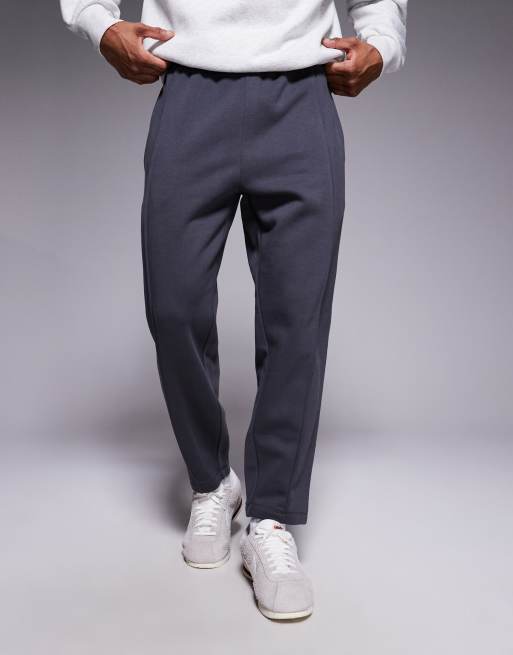 ASOS DESIGN tapered sweatpants with pin tucks in charcoal